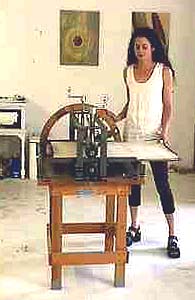 Betsey Garand in her Brooklyn studio with printing press