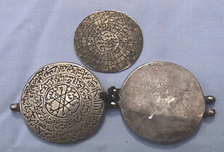 silver disk amulet